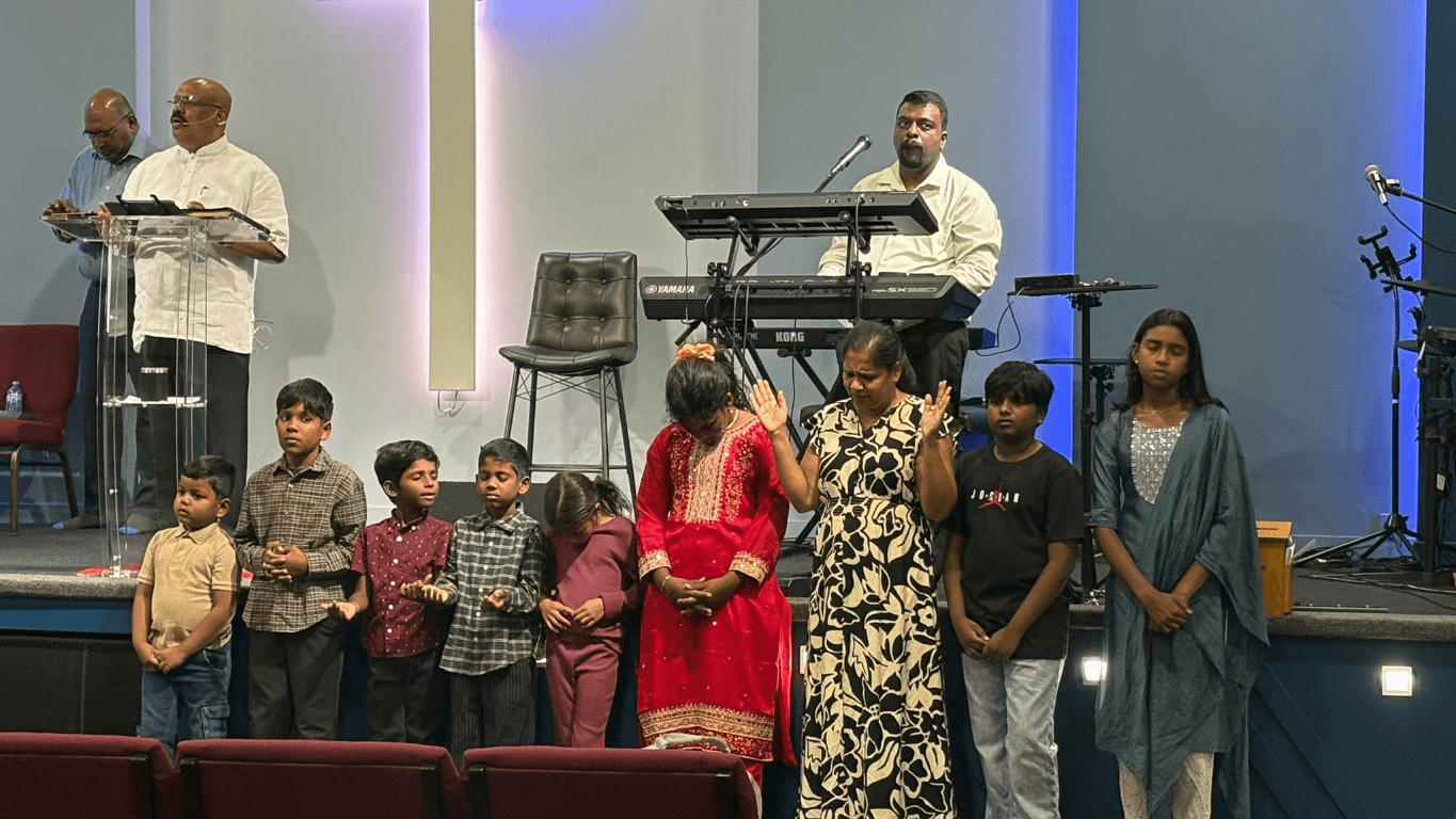 Church family united in worship with joyful praise